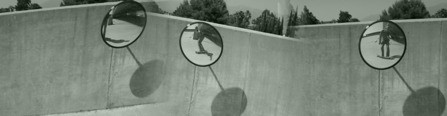 A longboard and a nearly empty parking garage make a good combination for killing time.